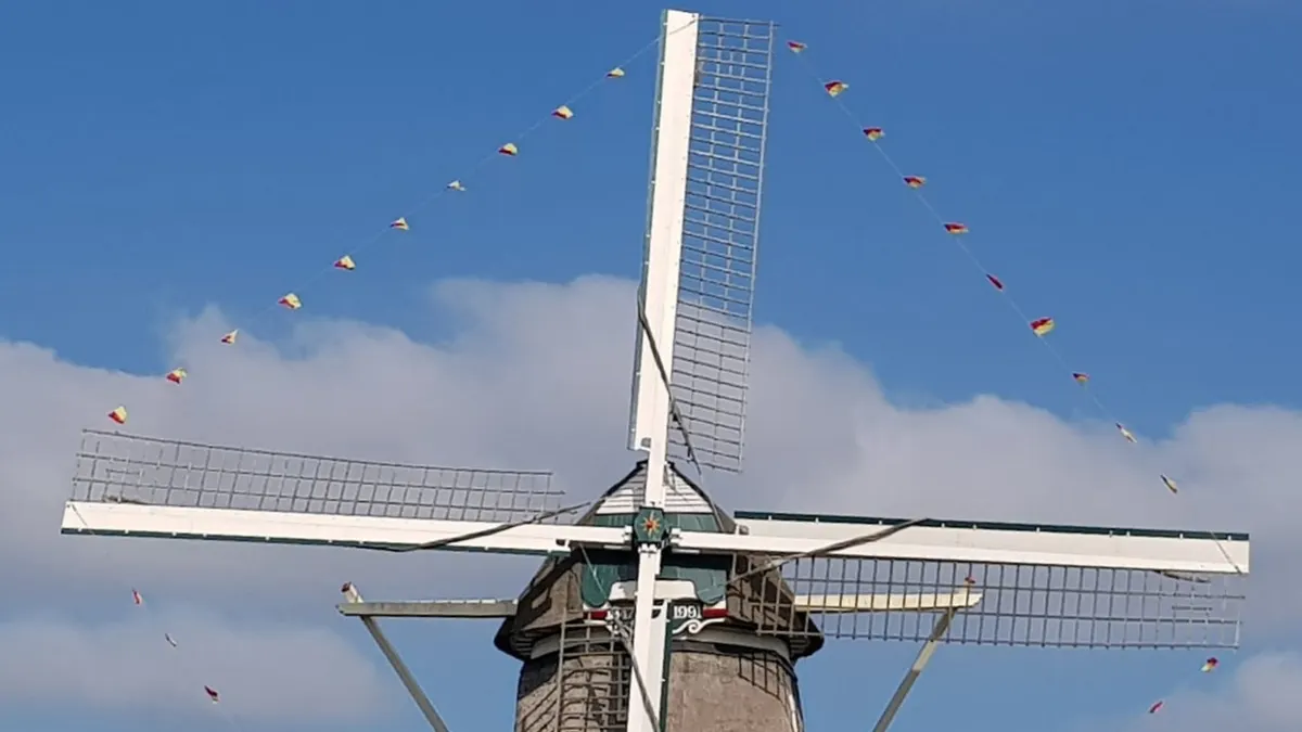 Molen Van Sloten (1990) & Kuiperij Museum - Windmill — rainy day guide Amsterdam